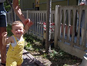 baby while making his first steps