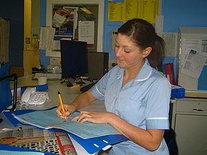British nurse in nurses' station.
